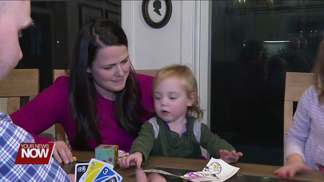 A mother discusses her journey of having a large brain aneurysm removed while pregnant